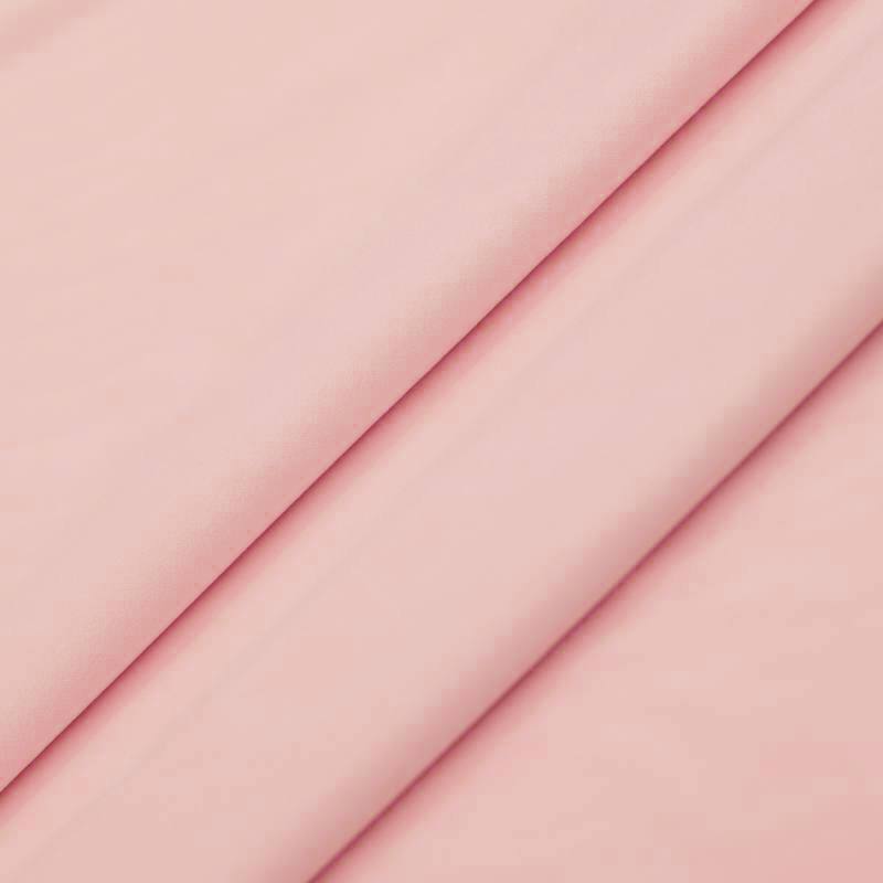 Tissu velours rose dragée