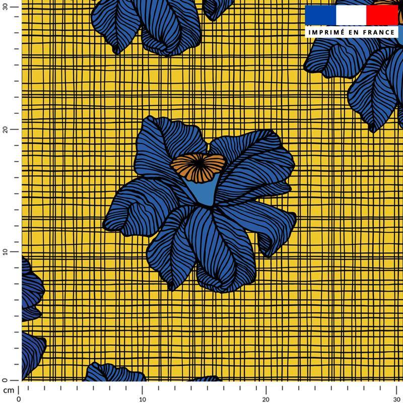 Tissu caban jaune motif wax fleur bleue