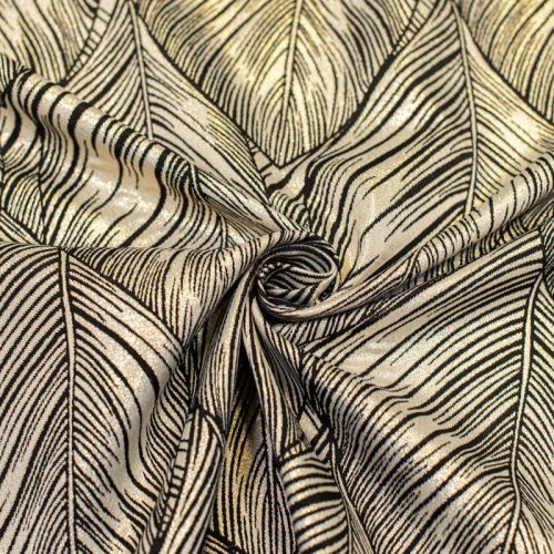 Tissu jacquard noir réversible motif feuille de palmier avec fil lurex doré