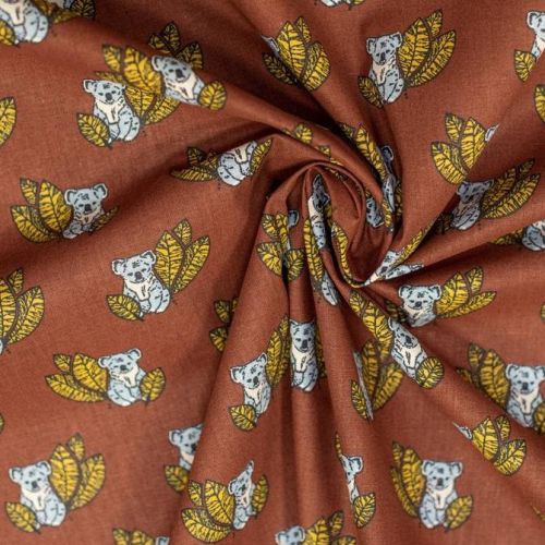 Popeline de coton marron motif koala Oeko-tex