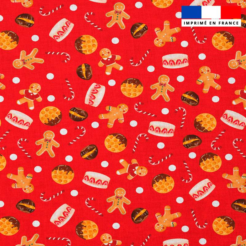 Popeline de coton peigné rouge motif pain d'épice et gourmandise de Noel