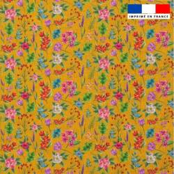 Popeline de coton peigné safran motif fleurs jungle