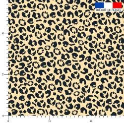 Peau léopard noir et beige - Fond beige
